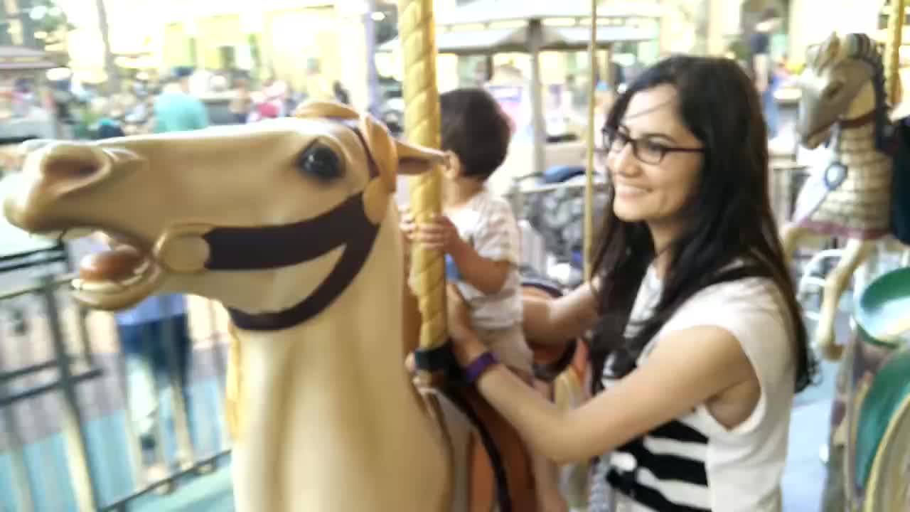 Eren riding a Carousel Horse