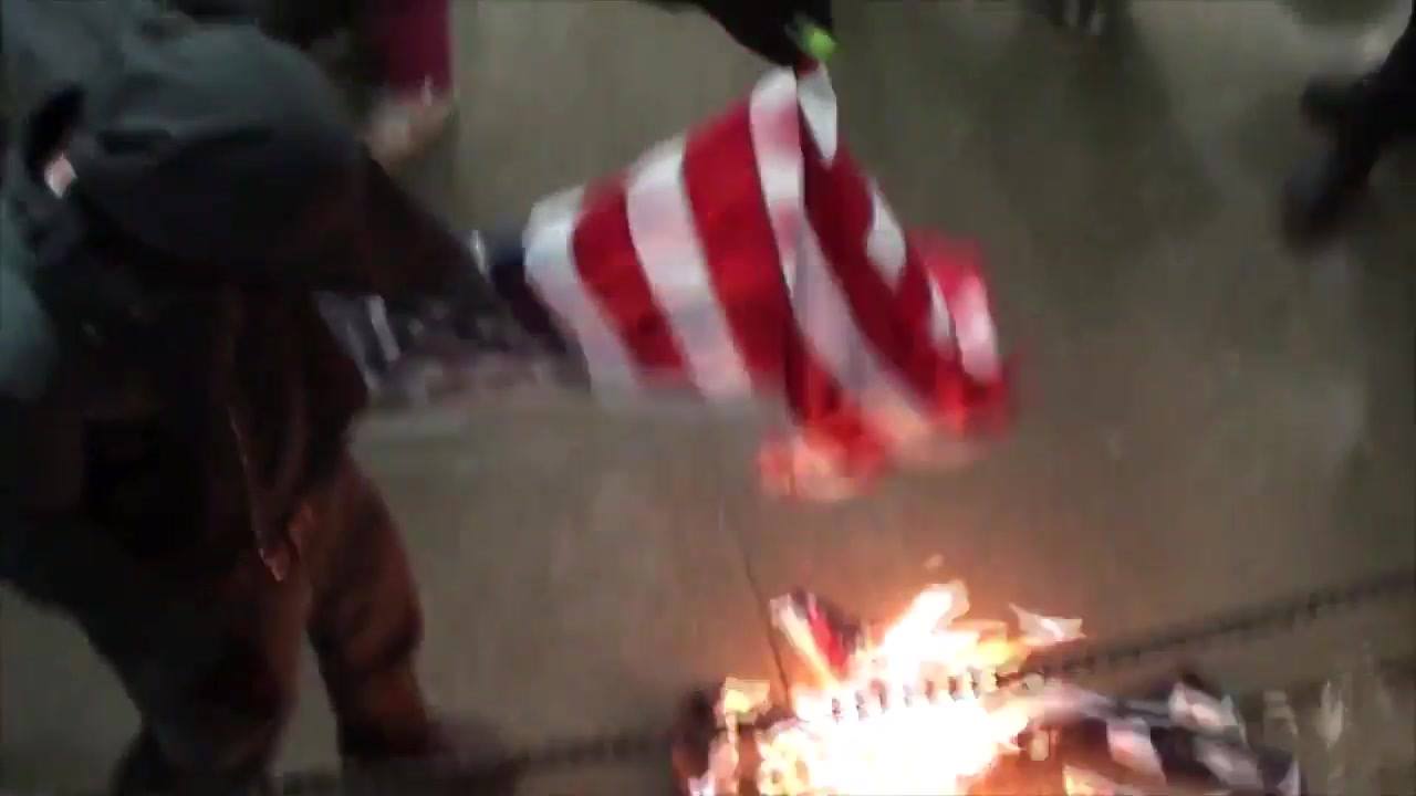 "Peaceful" left wing "anti-fascist" protesters burning the fascist American...