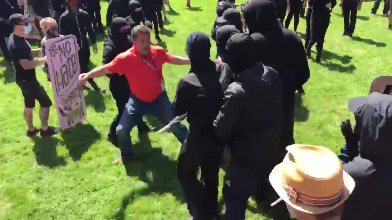 "Moderate" left wing protesters attacking journalists 
