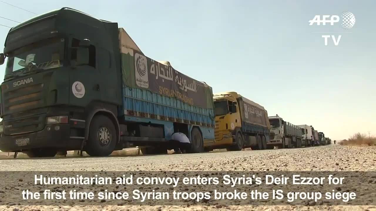 "Trucks deliver first food to Syria's Deir ez-Zor after...