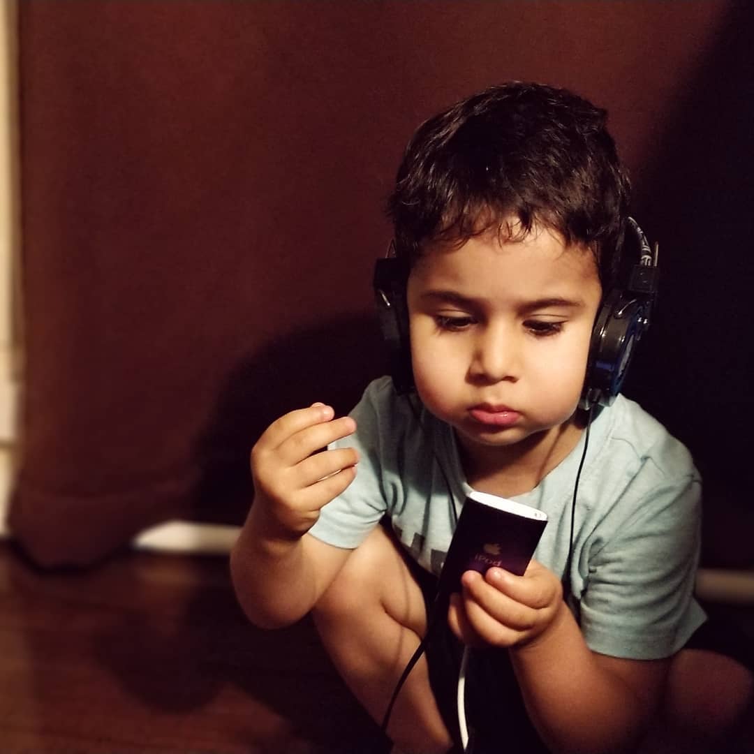 Eren listening to music