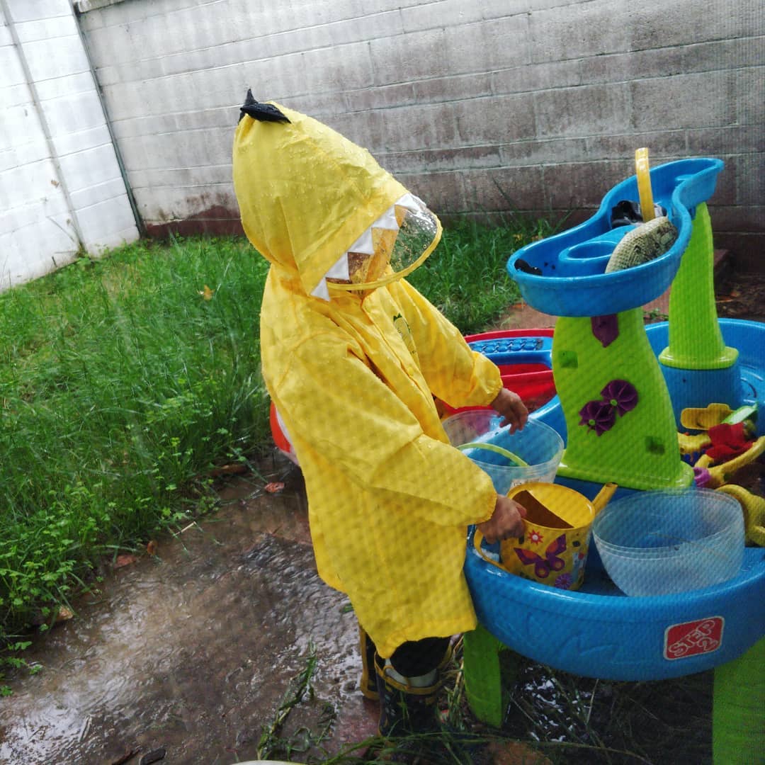 Eren playing in the rain