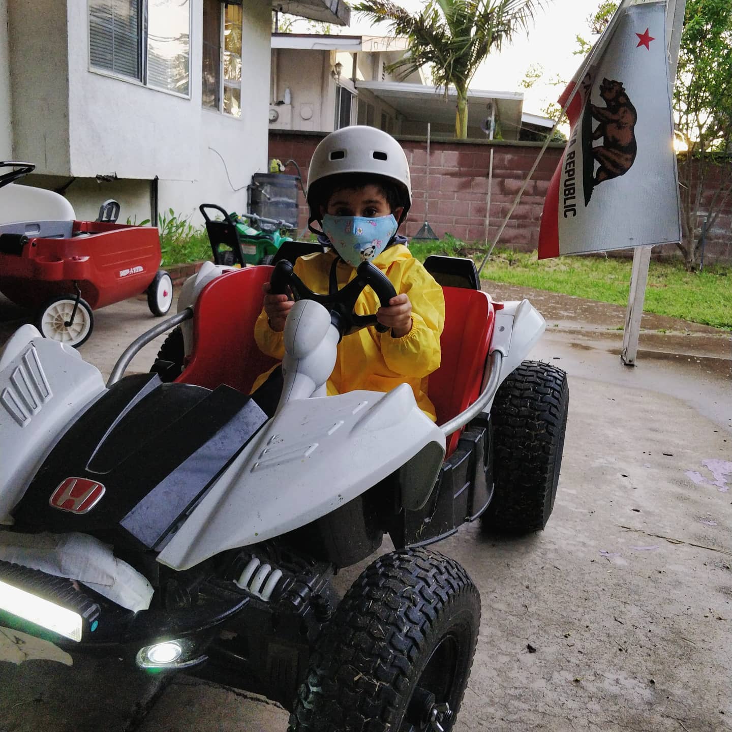 Eren geared up to drive his race car in...