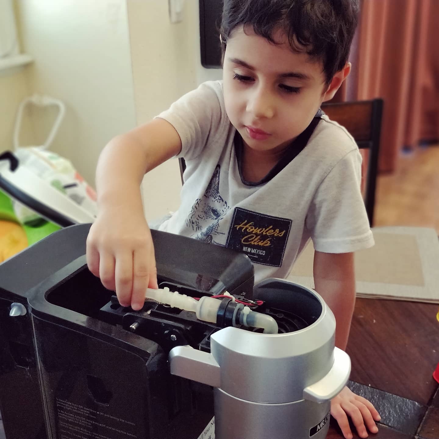 Eren helping me fix the coffee machine