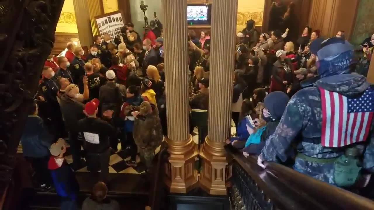 Michigan armed protesters have moved into the Capitol building...
