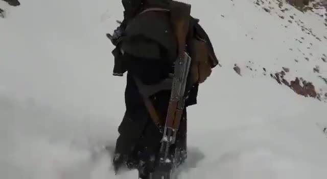 Taliban in mountain snow. People who enjoy central heating...