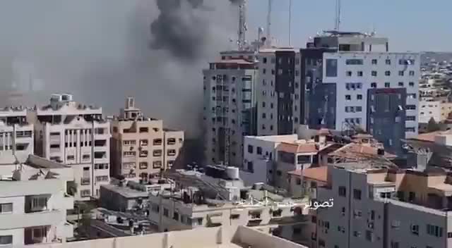 Israeli airstrikes collapse yet another multistory building in Gaza...