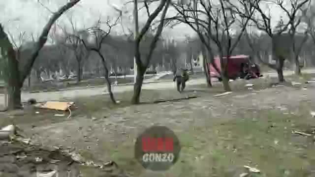 Russian forces in Mariupol in Ukraine rescue a Ukrainian...